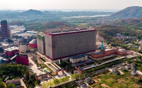 Небостъргачи за прасета. Китай построи две 26-етажни ферми за 1.2 милиона свине годишно